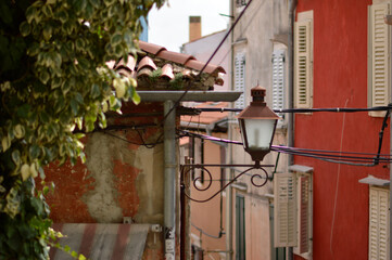 windows in old town of Rovinj with colorful wooden blinds