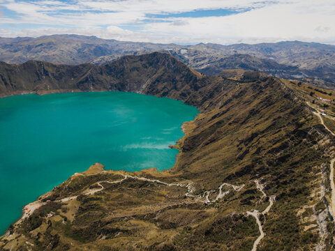 Aerial view of the striking turquoise Quilotoa lake nestled within a volcanic crater, a majestic scene, Quilotoa lake, Cotopaxi province, Ecuador.