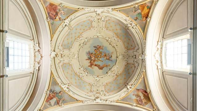 Intricate frescoed ceiling of Chiesa di San Vincenzo