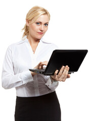 Fototapeta premium Portrait of a confident business lady with laptop on white