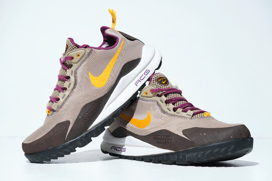 Kent, uk 01.01.2025 Nike ACG Wildedge Trail Shoes Grey Yellow Hiking Trekking Outdoor Trainers. Iconic retro vintage nike running and marathon hike trail shoes. Swoosh logo branded
