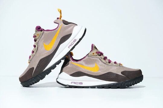 Kent, uk 01.01.2025 Nike ACG Wildedge Trail Shoes Grey Yellow Hiking Trekking Outdoor Trainers. Iconic retro vintage nike running and marathon hike trail shoes. Swoosh logo branded