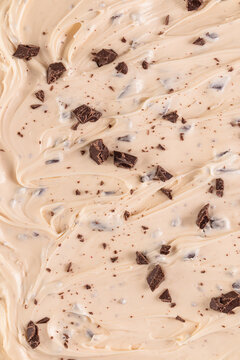 Creamy chocolate ice cream texture with chocolate chunks