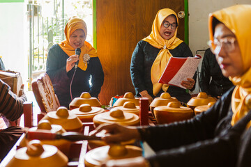Traditional Javanese gamelan musicians in performance