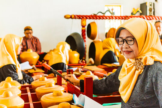 Traditional Javanese musicians playing the Gamelan