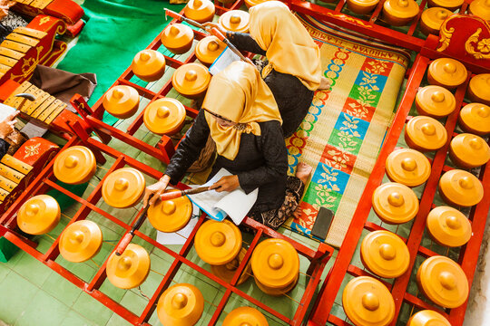 Traditional Javanese gamelan musicians in performance