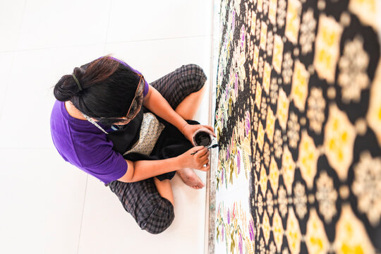 Traditional batik art creation process in Indonesia