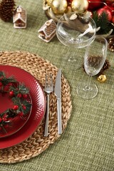 Festive table setting with Christmas decor, closeup