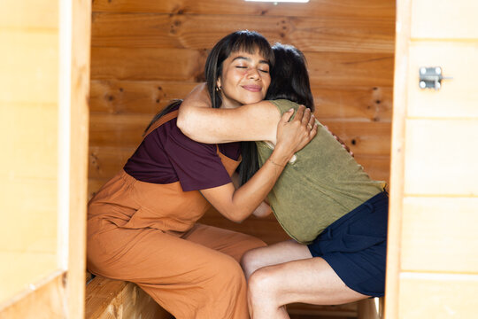 Warm embrace in cozy bee sauna setting