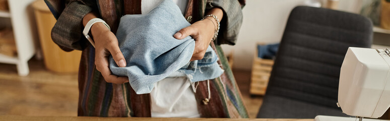 Woman creatively transforming old clothes into new treasures at her home workspace