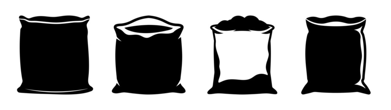 Four open sacks filled with fertilizer ready for use in agriculture and gardening