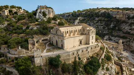 Obraz premium Aerial view of facade of the Church of San Matteo, located in Scicli, a city in the province of Ragusa, Sicily, Italy. This church is a symbol of Sicilian Baroque and dominates the city from above.