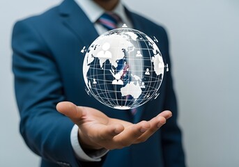 A man in a suit holding a digital globe with people icons representing global connections network concept