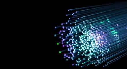 Fiber optic cables transmit data across distances, creating connections with vibrant strands. Fiber optic cables are essential for transmitting information,