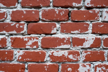 Red Brick Wall Texture with White Paint Peeling: Close-Up of Weathered Brickwork, Rustic Architecture, Grunge Background, Building Material Detail