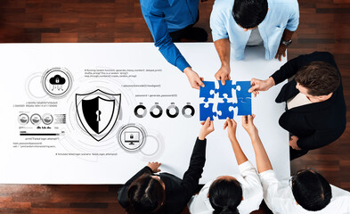 A diverse team collaborates on a data security project using puzzle pieces, showcasing innovative strategies and digital graphics in a modern office setting. Trope