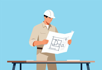A construction worker in beige uniform, white hardhat, examines blueprints at a wooden table against a blue background