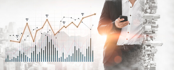 A business professional engages with a smartphone, surrounded by digital graphs showcasing growth...