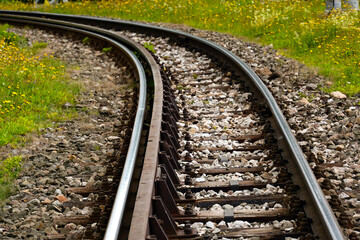 Fototapeta premium Track of the railway – two rails supporting and guiding the wheels of rail vehicles, at a specified distance from each other, serving as a railway track