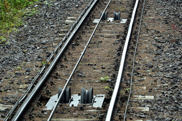 Track of the funicular cable railway  – two rails supporting and guiding the wheels of rail...