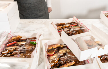 Assembling Assorted Gingerbread Cookies for Holiday Gifting
