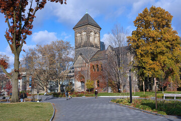 Old Science and Medicine Library building on the University of Toronto Campus, with autumn foliage