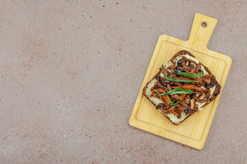 Healthy plant-based open sandwiches with sautéed Shimeji mushrooms. Protein rich vegan meal