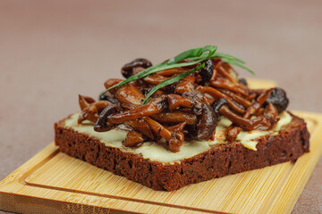 Healthy plant-based open sandwiches with sautéed Shimeji mushrooms. Protein rich vegan meal