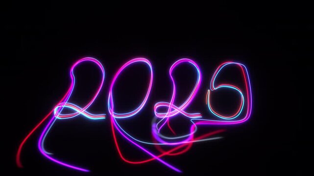 2026 year number formed by multicolor glowing neon light streaks. 3D animation of date writing and vanishing on a black background.