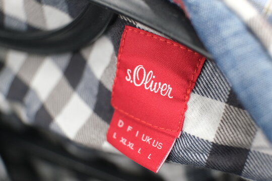 A close-up of the label on a S. Oliver shirt. Brand logo, clothing store. Fashion, brand, quality, textiles. Russia, Moscow, November 12, 2025.