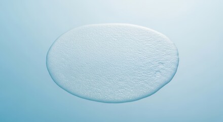 Abstract Blue Water Droplet on Smooth Surface with Soft Lighting