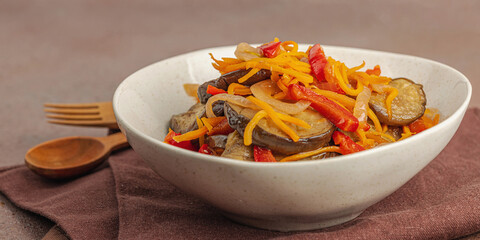 Vibrant salad in a trendy bowl. Fermented eggplant, bell pepper, carrot and onion. Healthy gut food