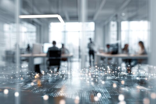 Blurry office scene depicting workers at desks, with digital overlay foreground