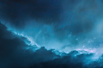 Fototapeta premium An ethereal cloudscape, transitioning from deep blues to luminous turquoise, suggesting a cosmic scene