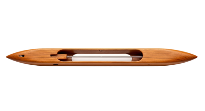 Polished wooden weaving shuttle with pointed ends and central cavity for thread—sleek, boat-shaped tool used in traditional textile weaving and handloom crafts