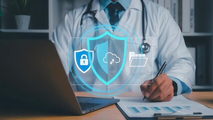 A doctor uses a laptop to manage secure medical data, showing health care privacy cloud protection encryption and patient record access through a digital interface. - Powered by Adobe