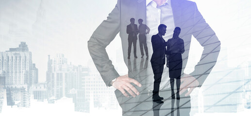 Confident businessman in suit with hands on hips, silhouettes of people discussing overlaid, modern office with city skyline background, concept of leadership