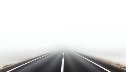 Empty black asphalt road disappearing into dense fog in overcast weather