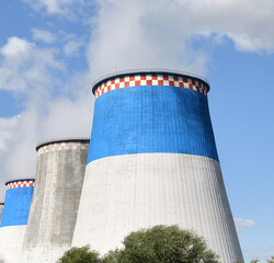 Three cooling towers at thermal power plant at Moscow, Russia