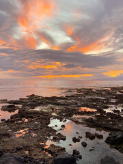 Beautiful ocean sunset in El Camison beach, Tenerife, Canary Islands, Spain. Travel concept.