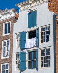 medieval building with window and sheets hanging to dry