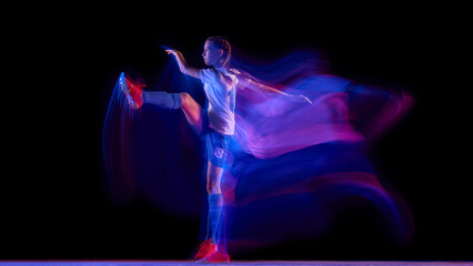 Soccer player stretching leg for kick in colorful motion blur. Concept of warm-up training, coaching visuals, health and fitness education, and advertising for sports brands.