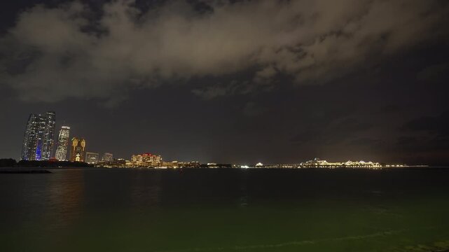 night illumination abu dhabi city famous downtown bay front panorama timelapse 4k united arab emirates  