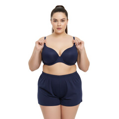 Obraz premium Confident plus-size woman in navy lingerie against an isolated transparent background
