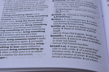 Obraz premium English Dictionary Page Close Up With The Word Meaning Of -broach