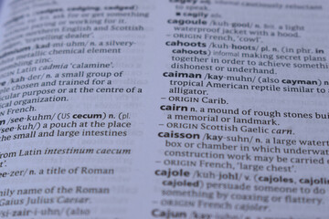 Obraz premium Close Up Of English Definition Dictionary Page Word Of - cairn