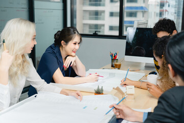 Team meeting or workshop in a modern office. Collaboration, teamwork, project development, architecture, engineering, planning, diverse professionals, corporate culture, strategic meeting.