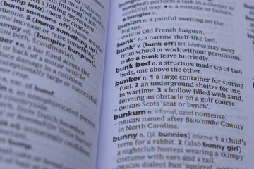 Obraz premium English Dictionary Page Close Up With The Word Meaning Of -bunker