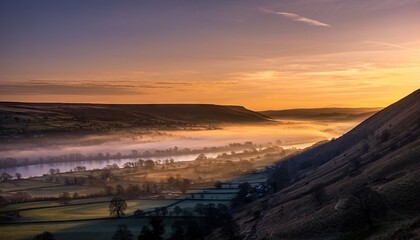 Golden Sunrise Illuminates Misty River Valley Landscape with Rolling Hills and Distant Farms at Dawn