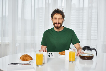 Warm breakfast moments shared in a cozy home with a young man enjoying tasty treats